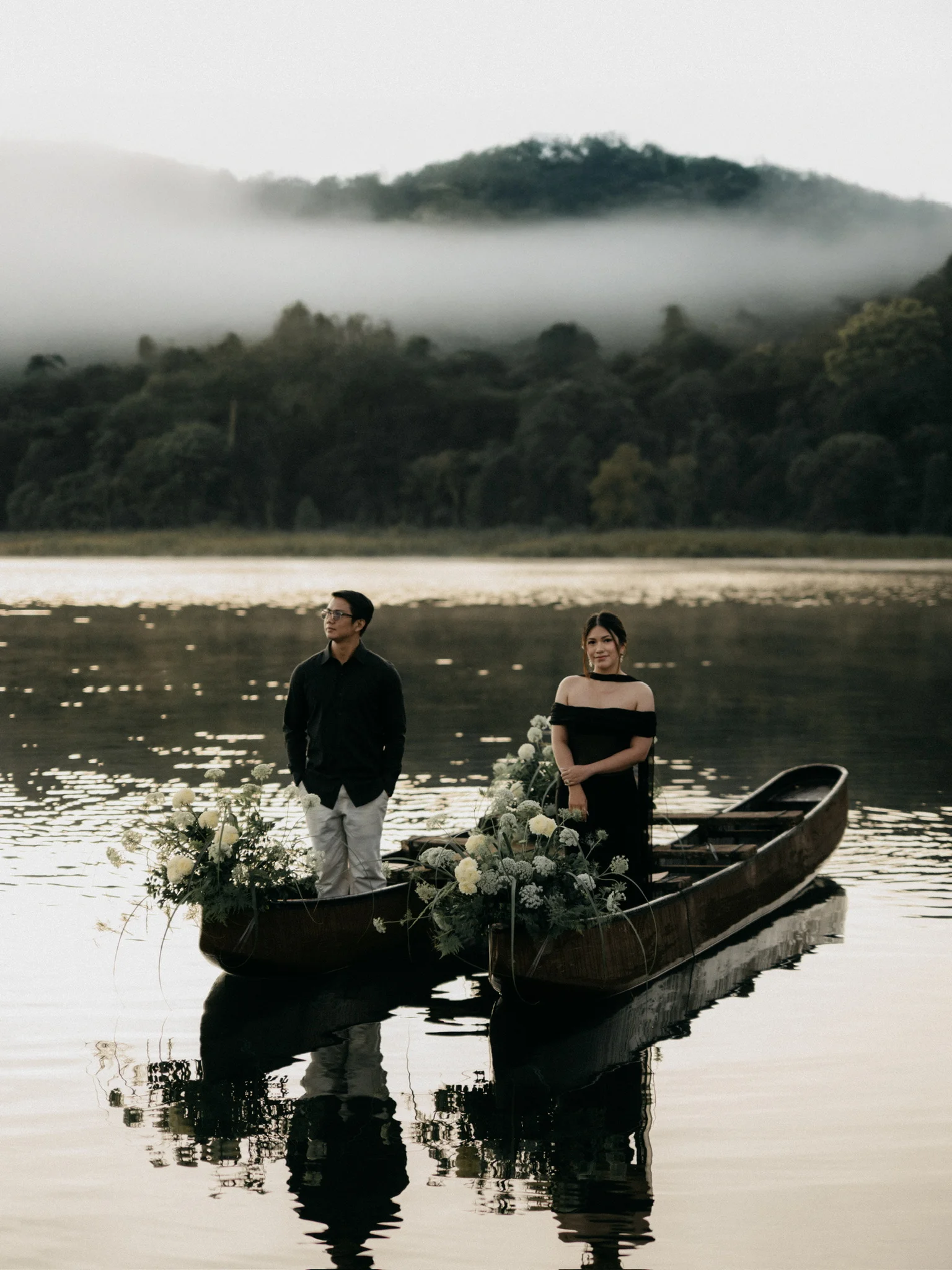 Carlo and Trixia in a boat on the lake